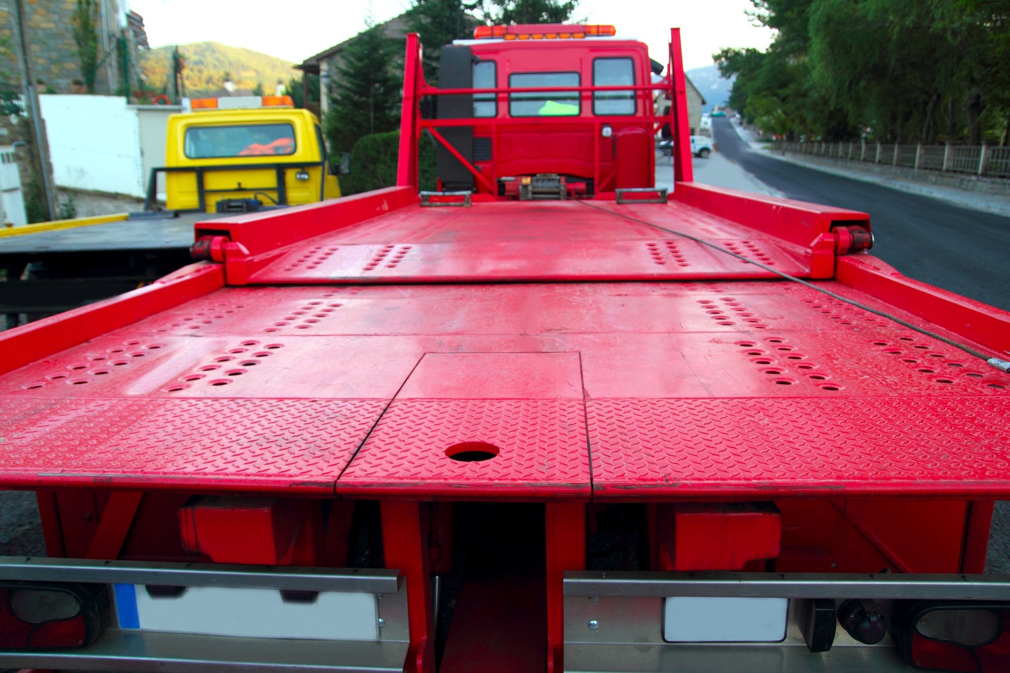 Tow car truck red rear view perspective platform towing lead generation